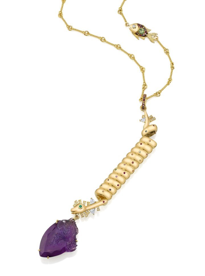 Electric eel wish container necklace in 18k yellow gold adorned with diamonds, multicolour sapphires in the body and emerald eyes with an amethyst carved by the master Michael Peuster