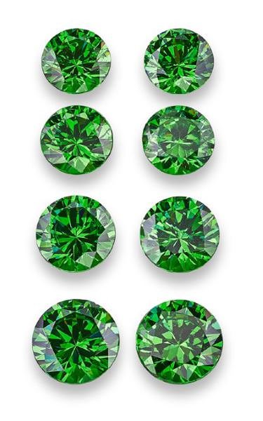 Eight African demantoid garnets in rare deep green colour