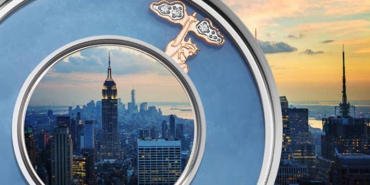 America - Precious Howlite is used as a backdrop in this World Charm to evoke an imagery of blue skies, on top of which the Statue of Liberty stands out graciously, while the clouds over torch shine brightly through the adornment of diamonds incorporated in this Charm.