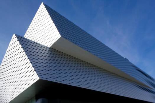 The imposing metal mesh facade over the three-storey Hall 1 complex.