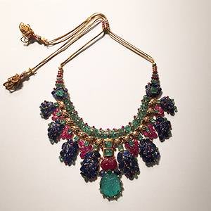 Necklace: Cartier Paris, special order, 1938. Gold, platinum, diamonds, emeralds, rubies, sapphires, half pearls, and enamel. 