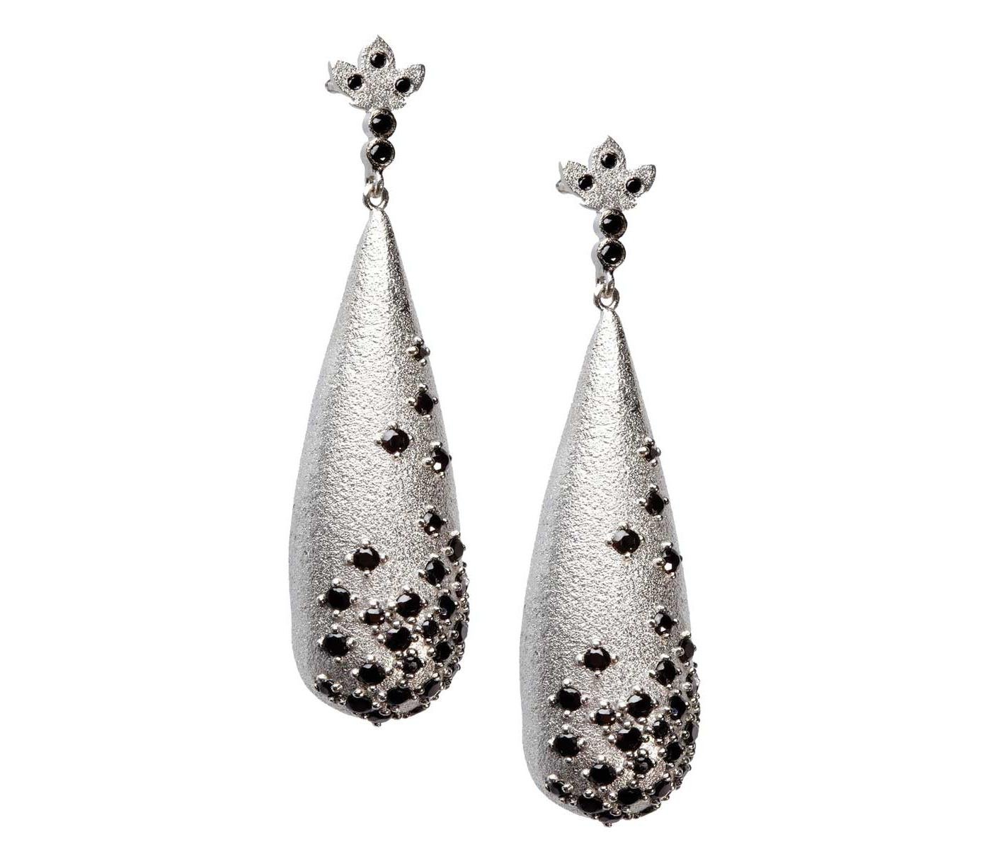 Earrings by Coomi