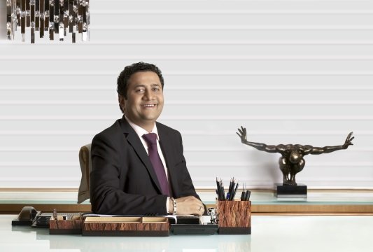 Mr Dinesh Lakhani, Director