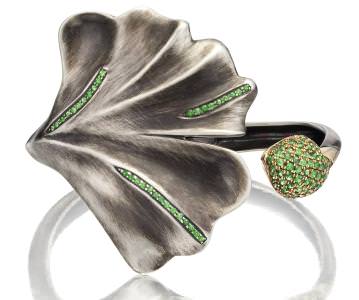 Silver, 14K yellow gold, and tsavorite “Gingko” hinged cuff by Babette Shennan (Centurion Emerging Designer).