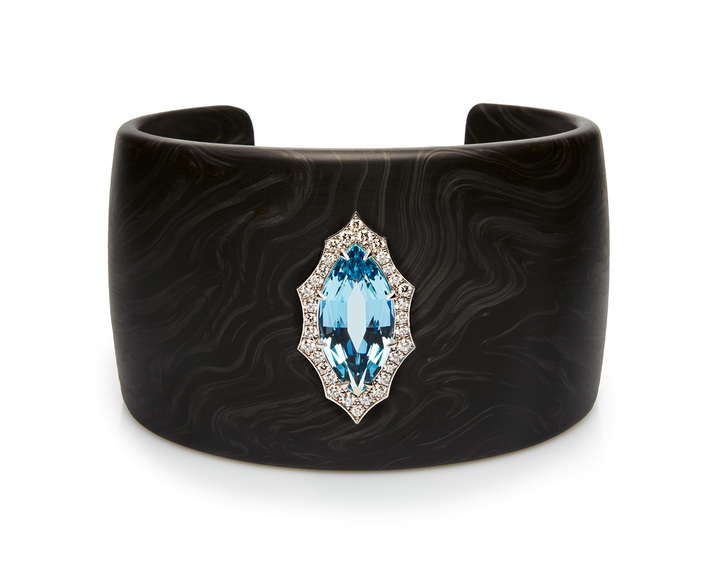 Carbon fibre cuff with a 5.52 cts navette-cut aquamarine and diamonds set in 18k white gold.